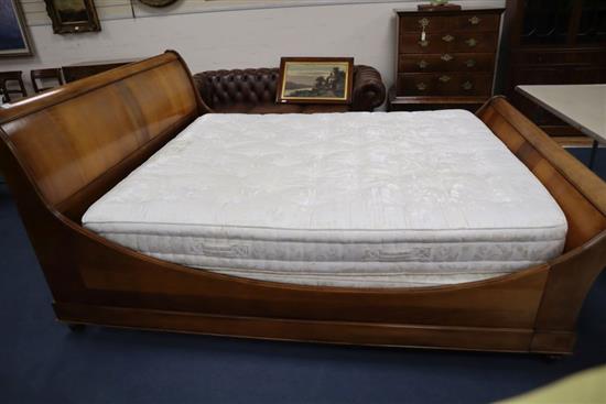 A French Empire style mahogany sleigh bed frame with So to bed Thornton mattress, width 5ft. 6in.